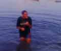 Ingrandisci Tony vestito al mare