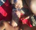 Ingrandisci Ste e Sham on the beach